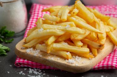 Crispy French fries with ketchup and mayonnaise. Crispy French fries with ketchup and mayonnaise.